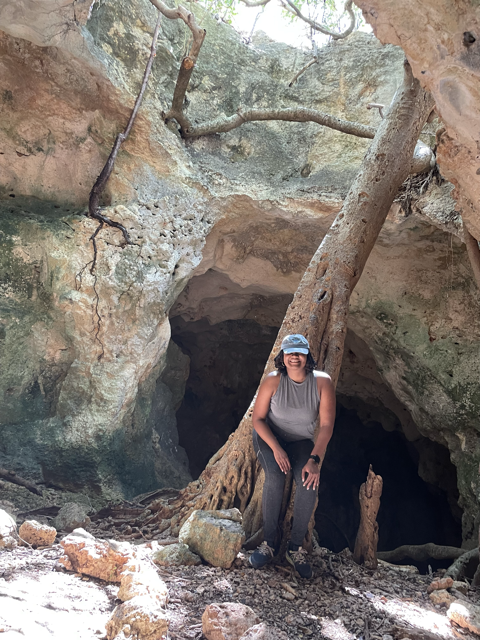 Woman hiking and enjouying a tour experience in the Caribbean.